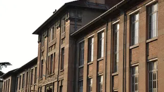 The facade of a French lycée (high school)