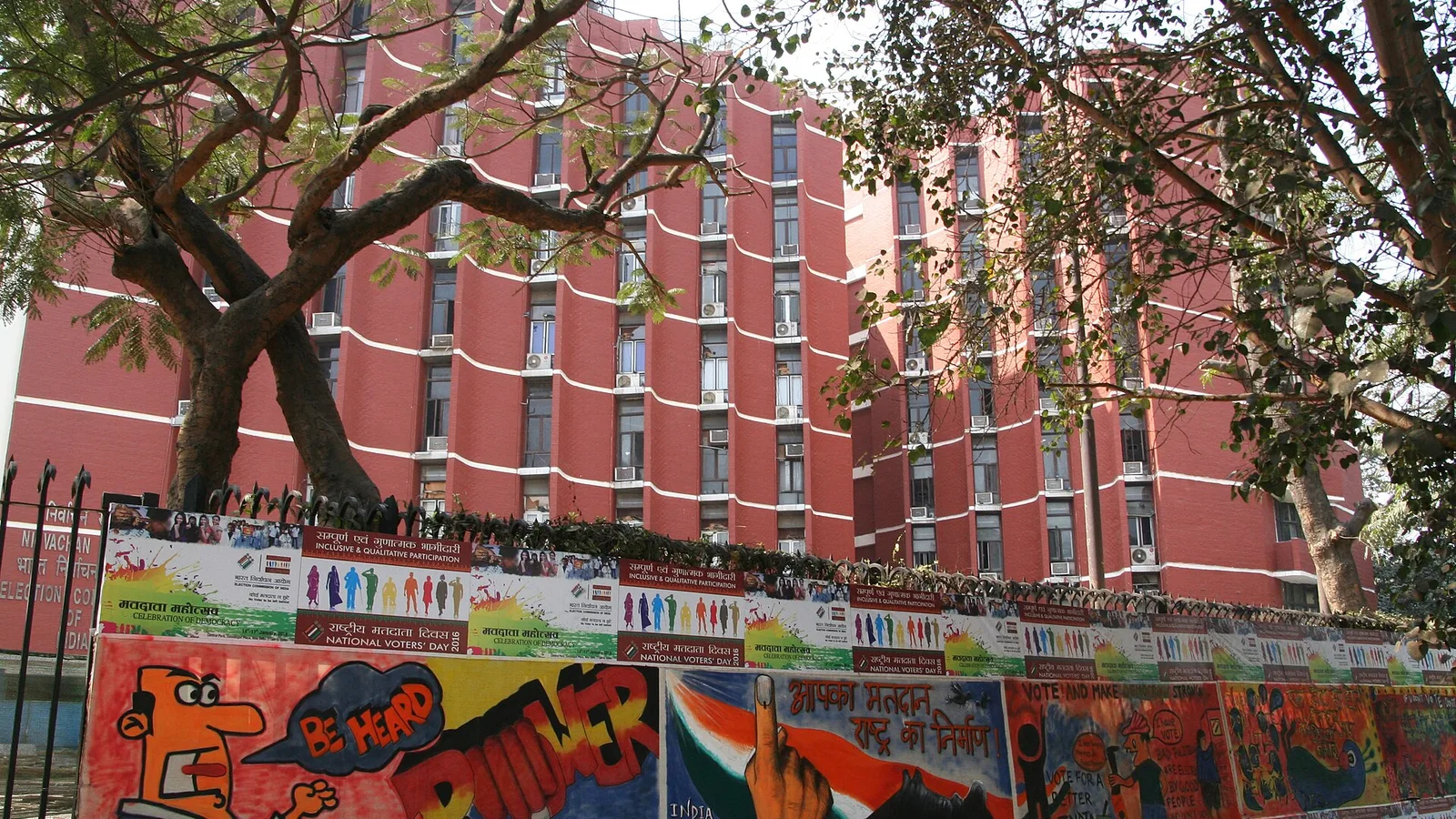 Posters outside the Election Commission of India in New Delhi.