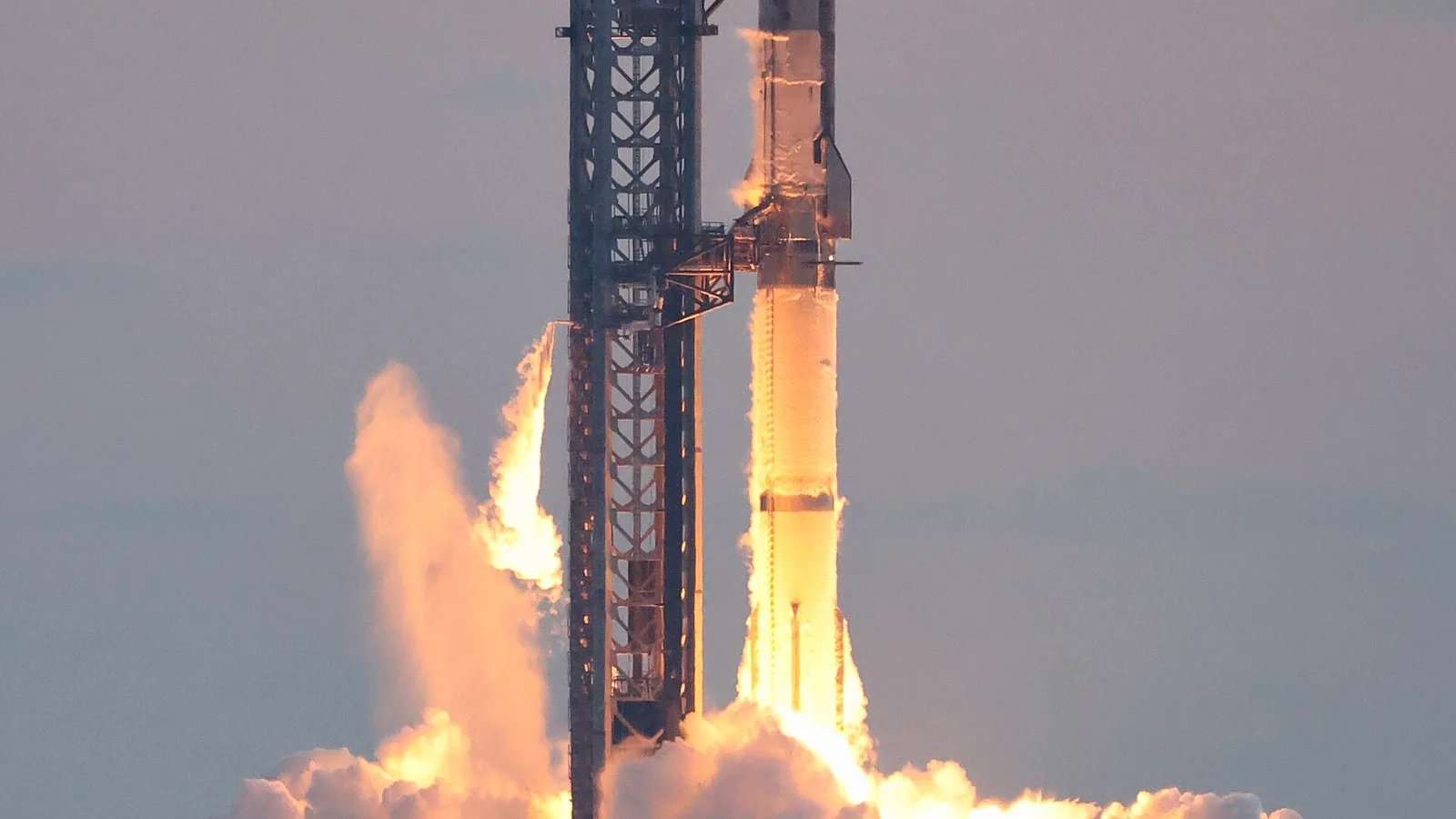 A SpaceX Starship rocket lifting off from Starbase, Texas