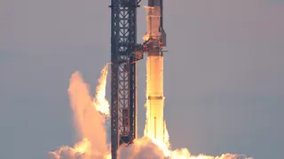 A SpaceX Starship rocket lifting off from Starbase, Texas