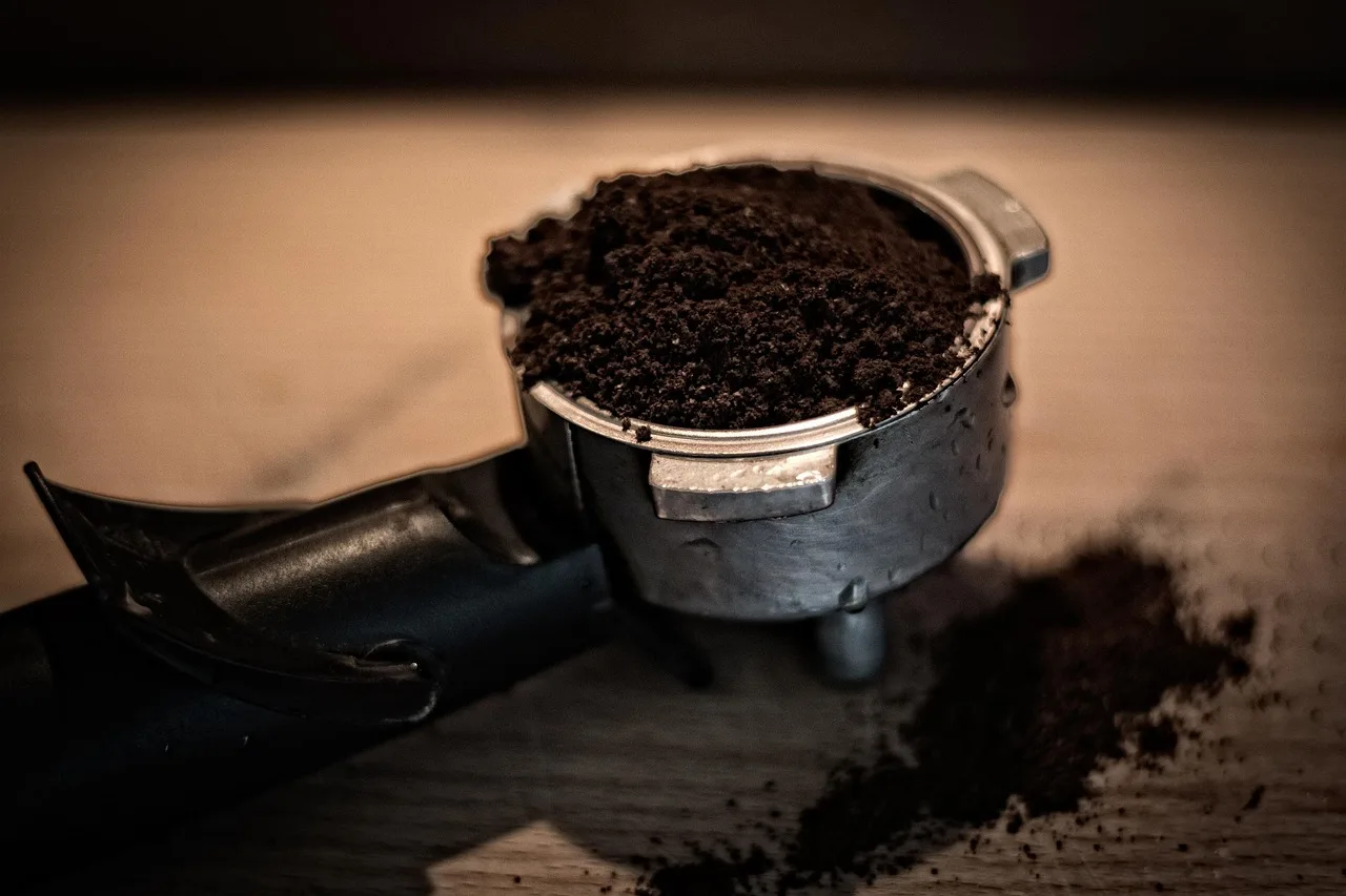 Ground coffee in an espresso basket